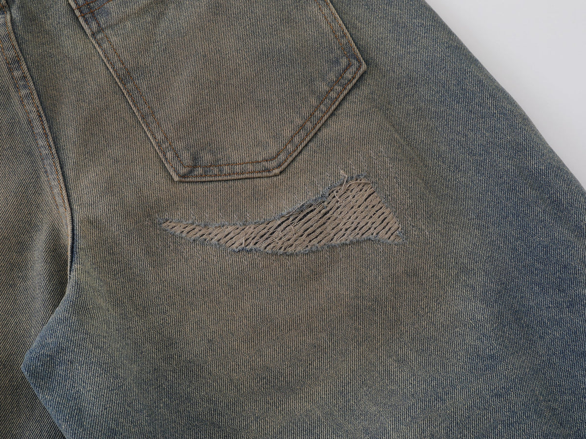 Pantalon en jean incurvé effet vieilli Madxmarx