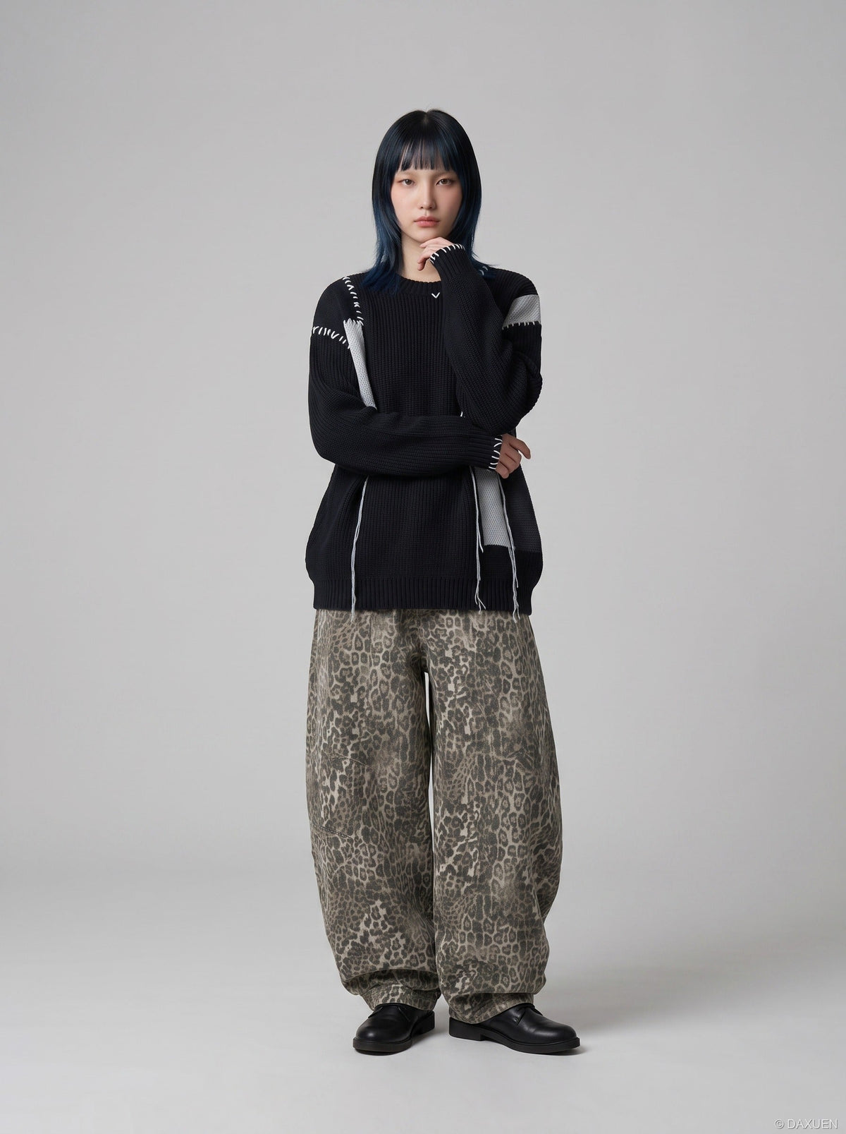 DAXUEN black oversized patchwork knit sweater — model photo