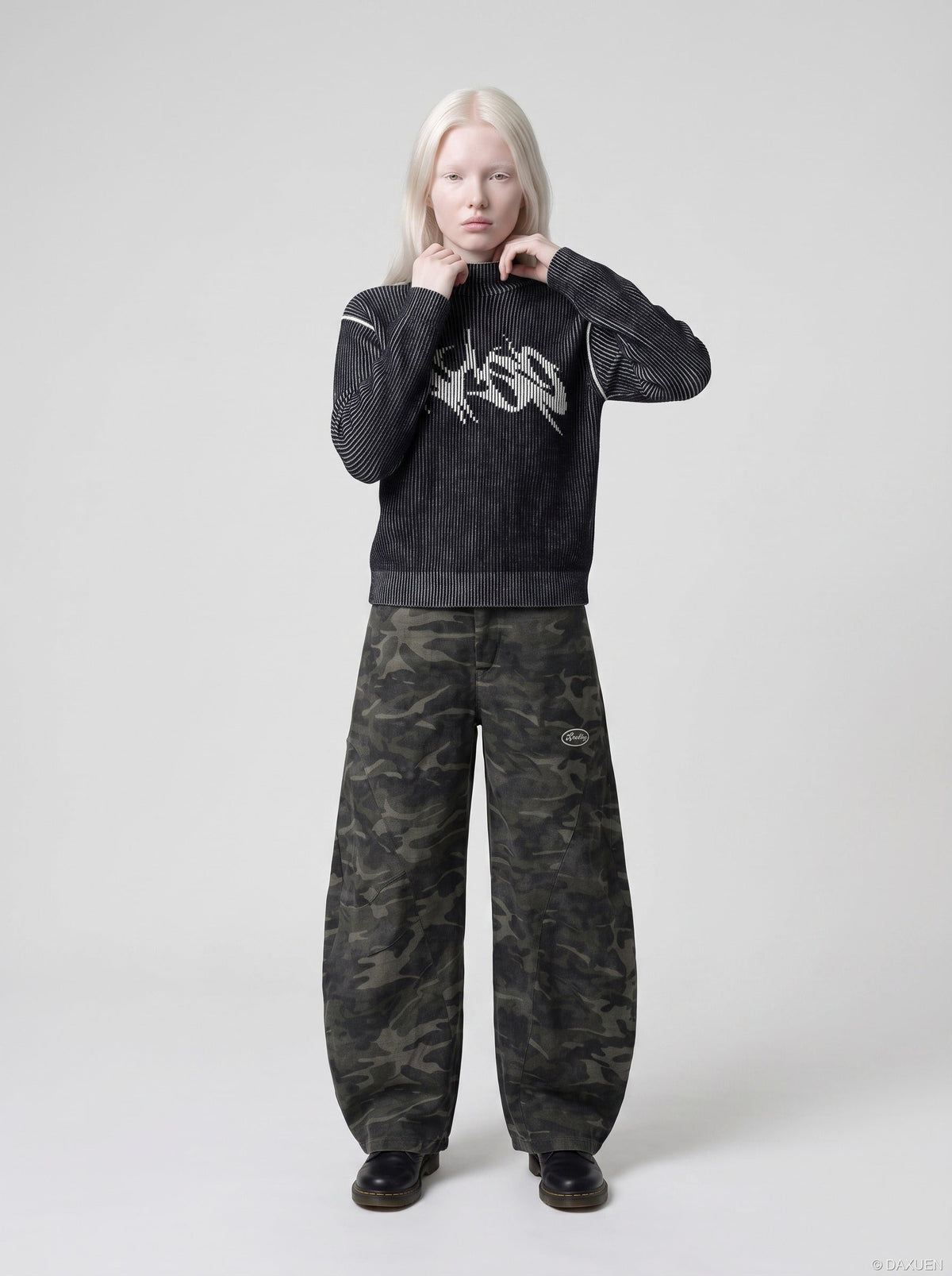 DAXUEN black vertical ribbed abstract graphic mock neck sweater — model photo