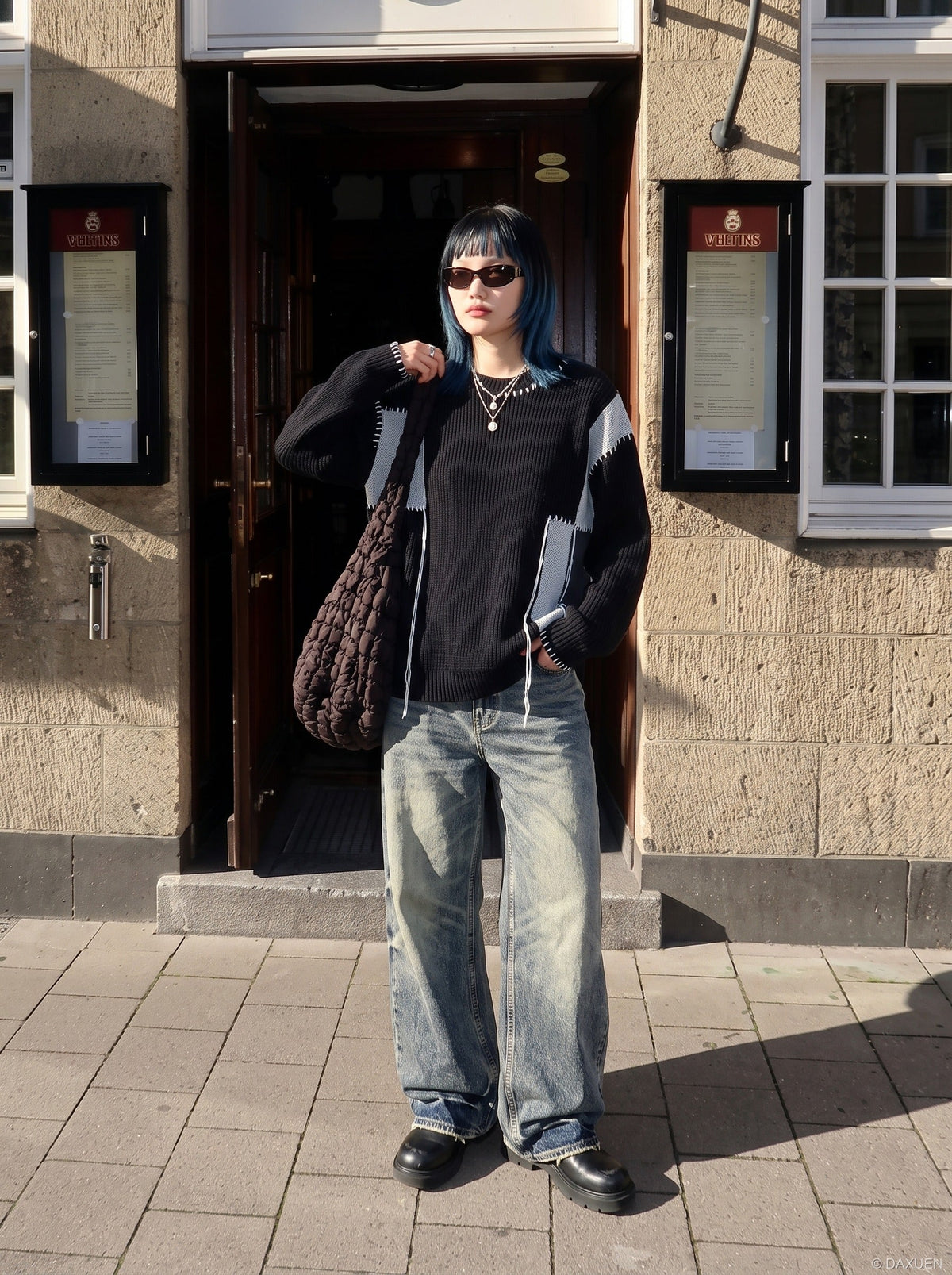 DAXUEN black oversized patchwork knit sweater — model photo