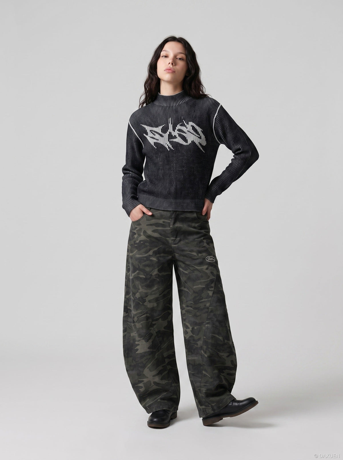 DAXUEN black vertical ribbed abstract graphic mock neck sweater — model photo