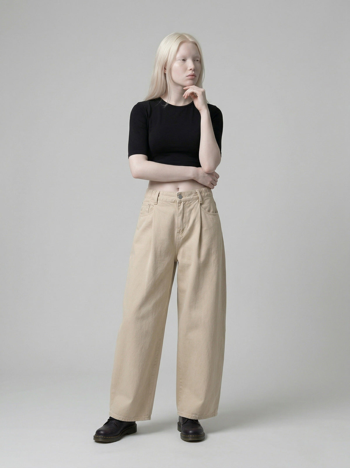 DAXUEN Beige high-waisted wide leg trousers — model photo