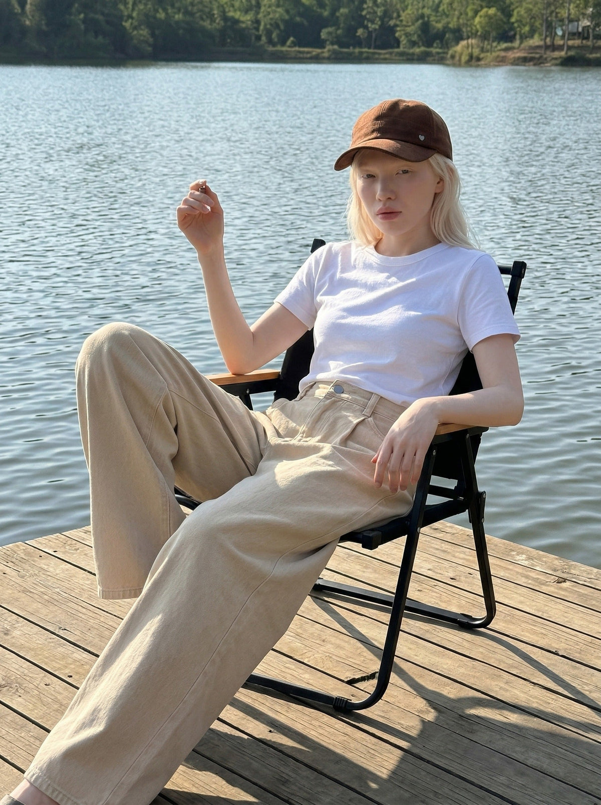 DAXUEN Beige high-waisted wide leg trousers — model photo