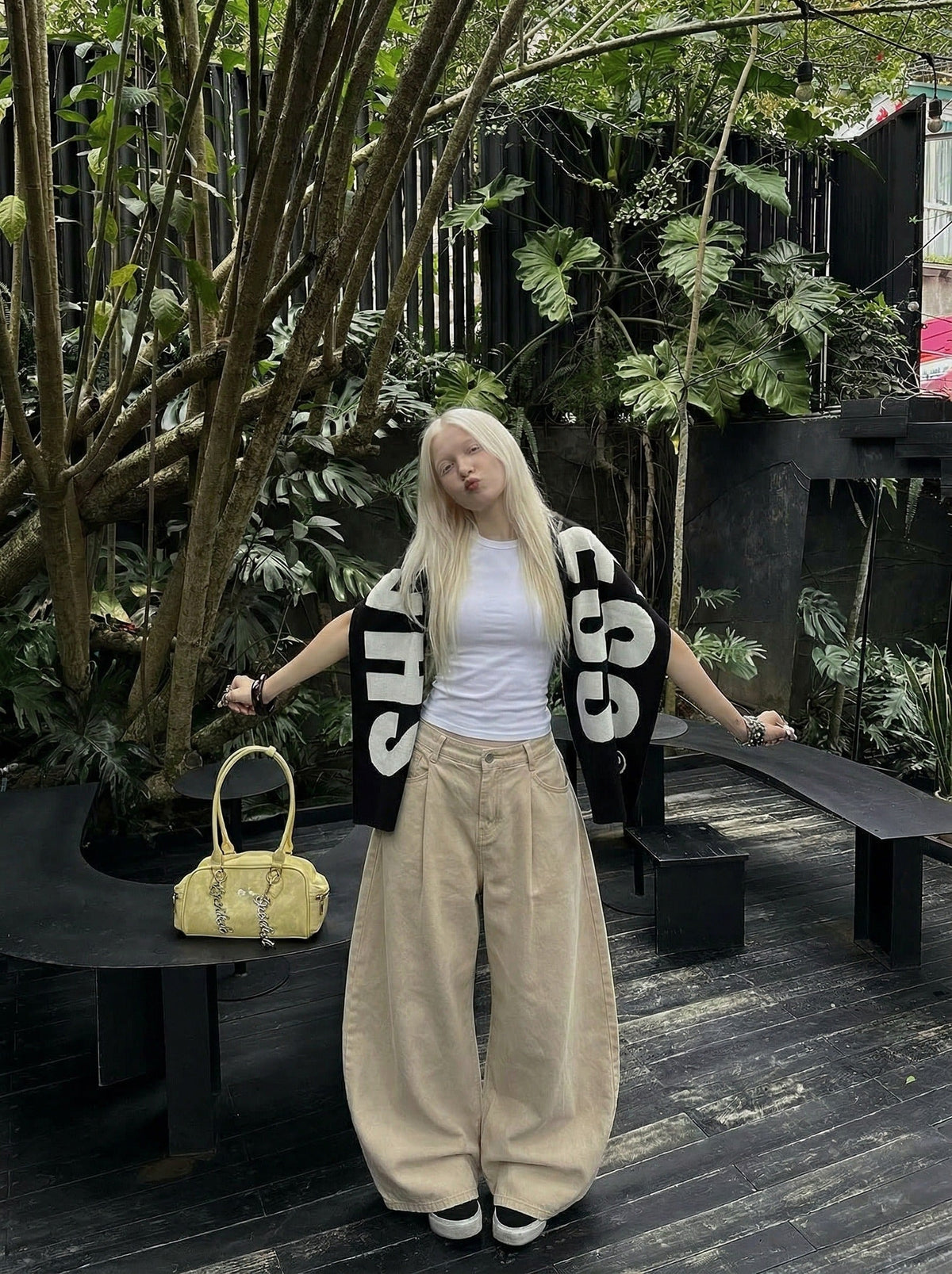 DAXUEN Beige high-waisted wide leg trousers — model photo