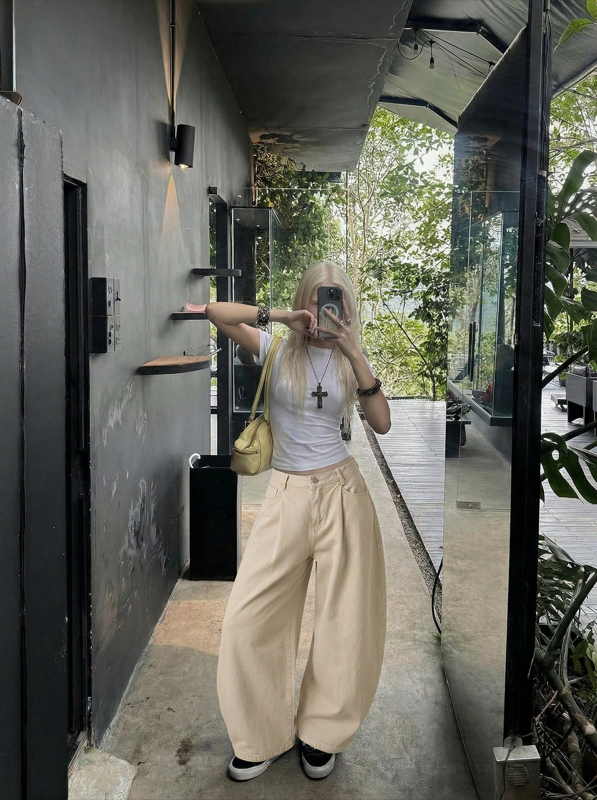 DAXUEN Beige high-waisted wide leg trousers — model photo