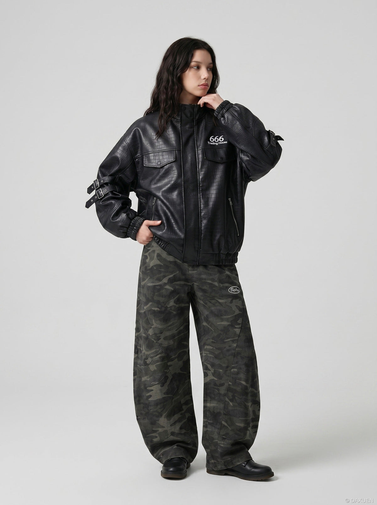 DAXUEN black crocodile-embossed faux leather jacket — model photo