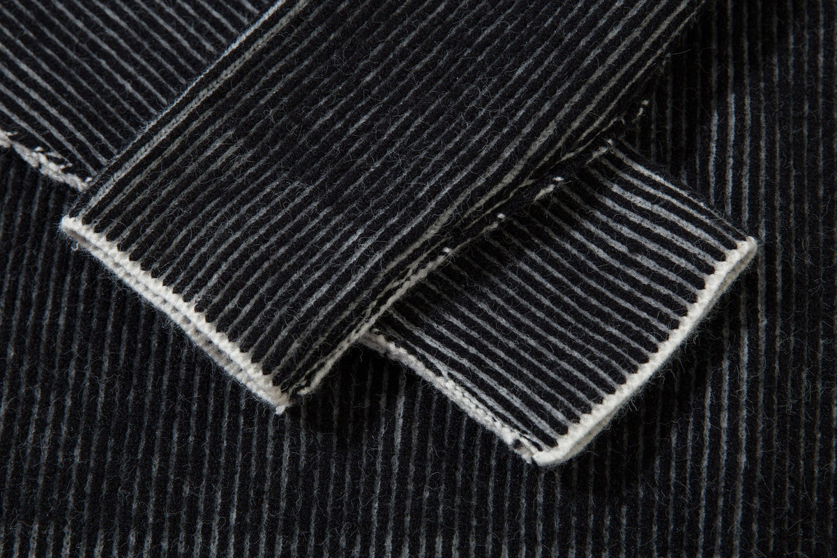 DAXUEN black vertical ribbed abstract graphic mock neck sweater