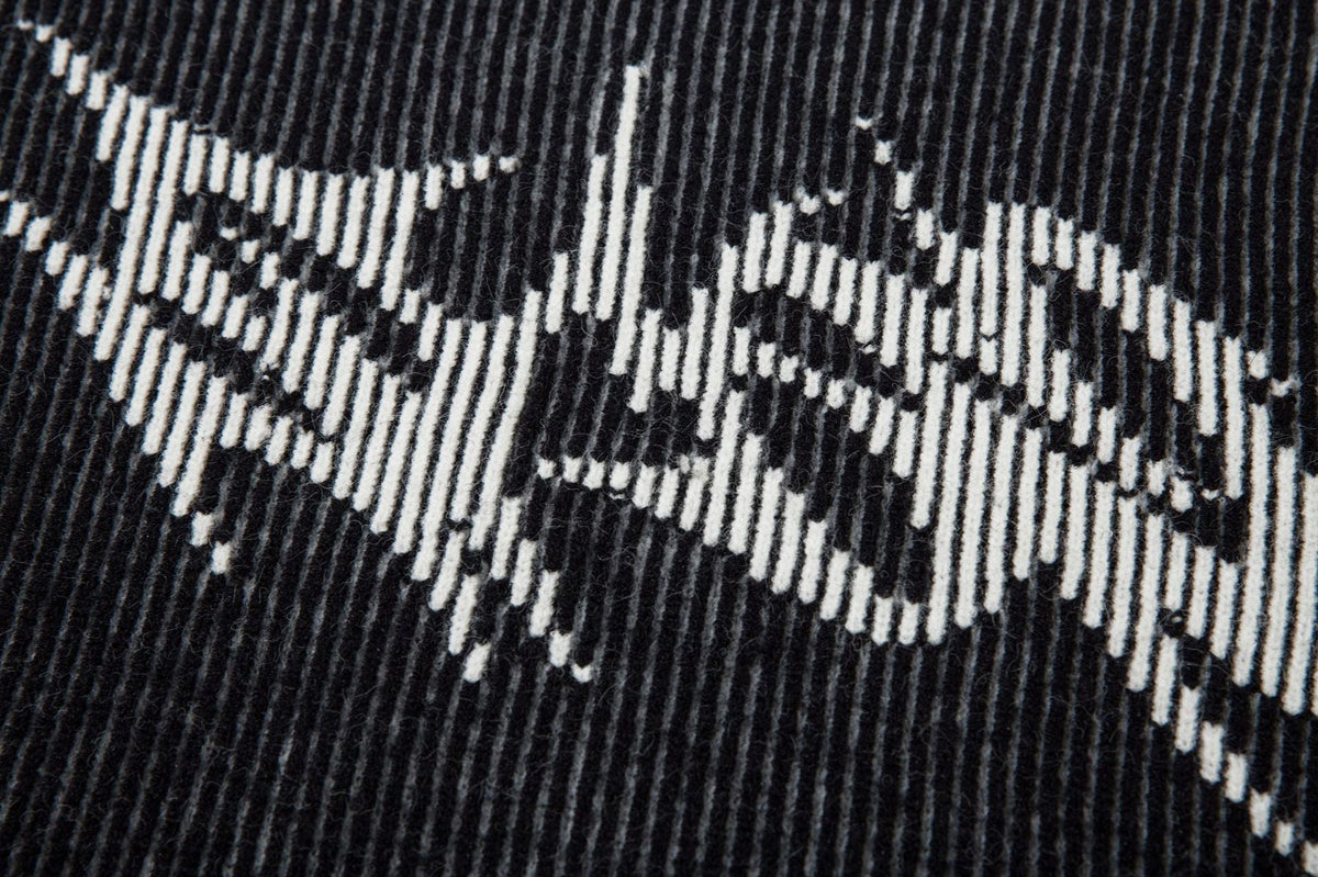 DAXUEN black vertical ribbed abstract graphic mock neck sweater