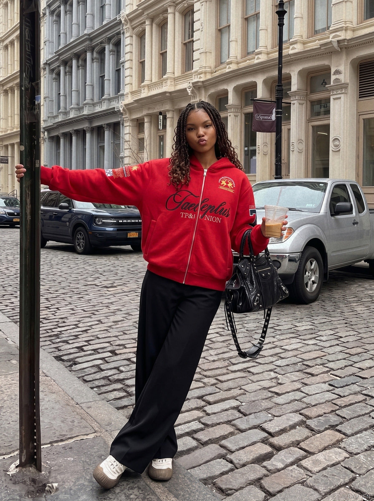 DAXUEN solid red full-zip embroidered crest hoodie — model photo
