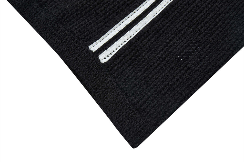Bold Perforated '7' Black Knit Polo