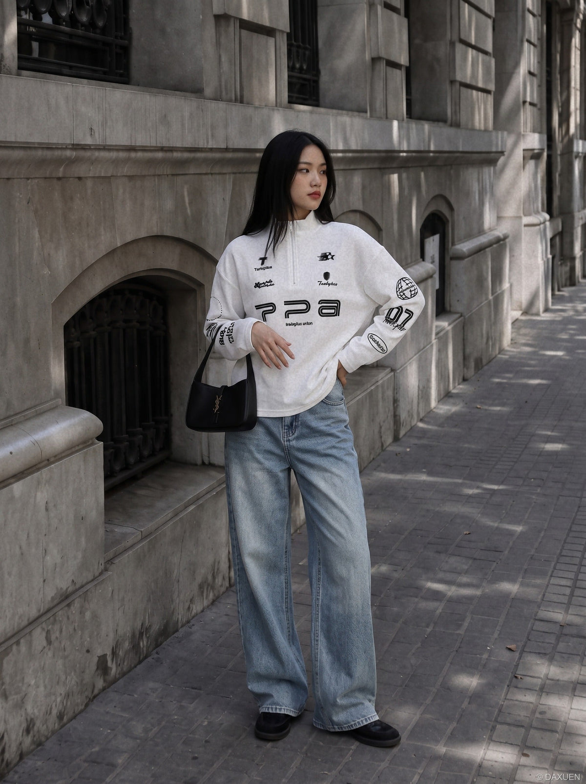 DAXUEN black bold graphic mock neck pullover top — model photo