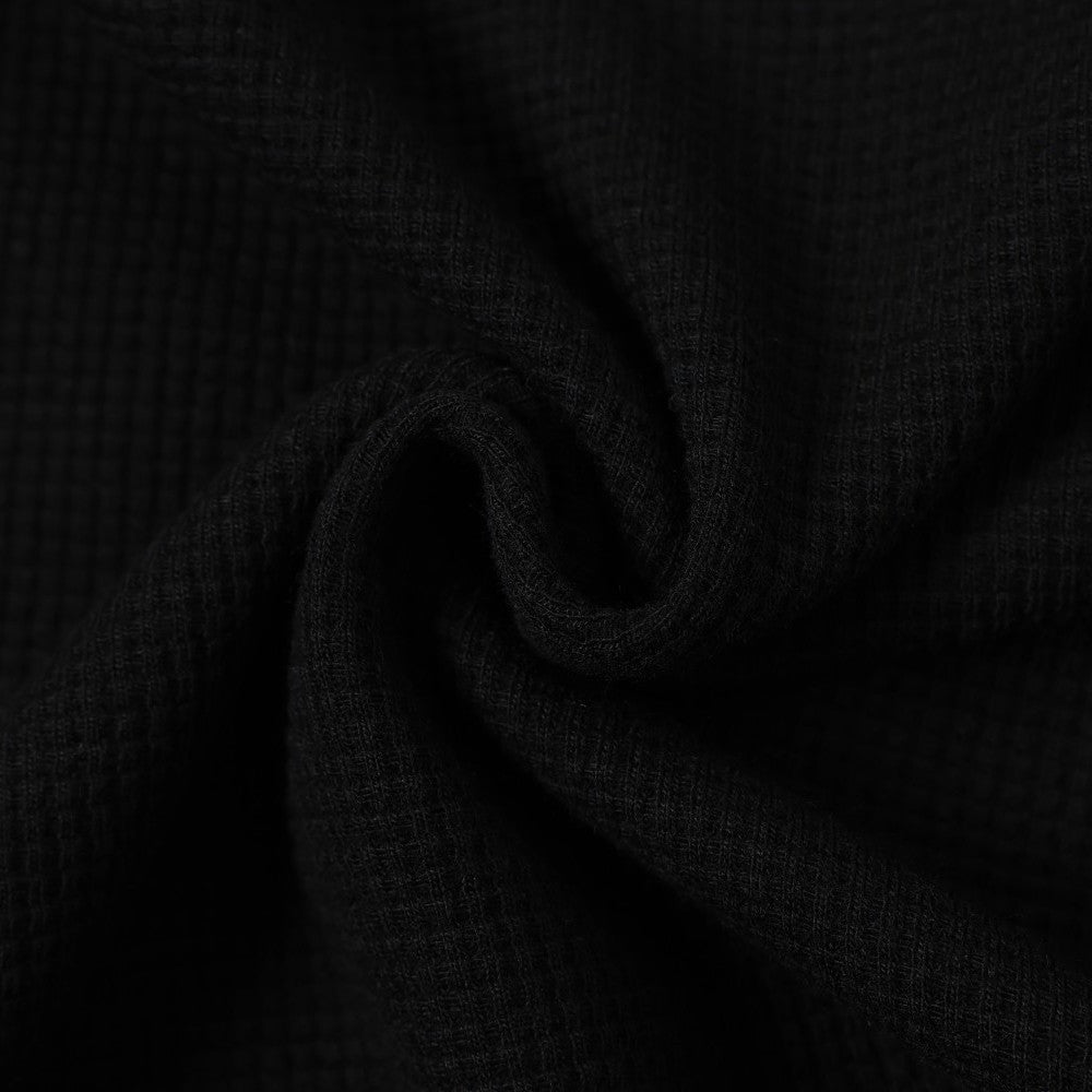 DAXUEN black mock neck pullover with bold wavy graphics