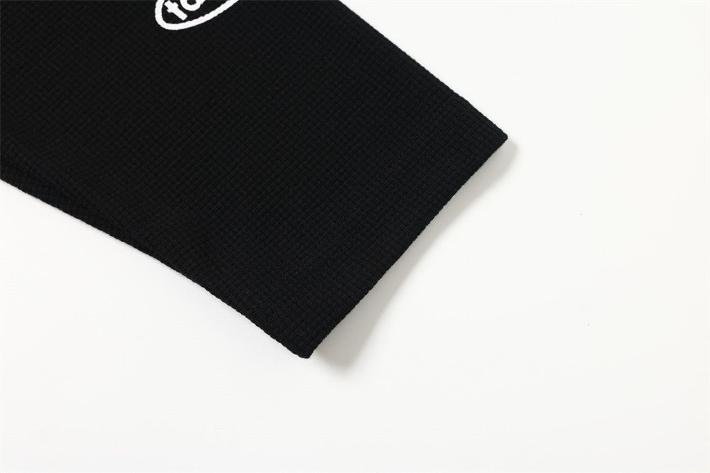 DAXUEN black mock neck pullover with bold wavy graphics