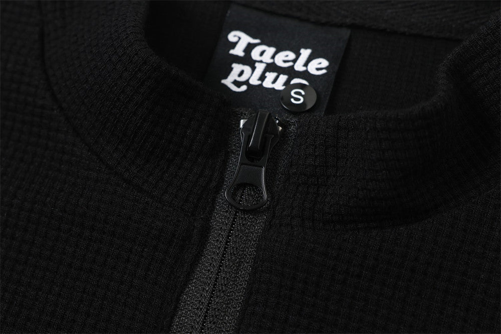 DAXUEN black mock neck pullover with bold wavy graphics