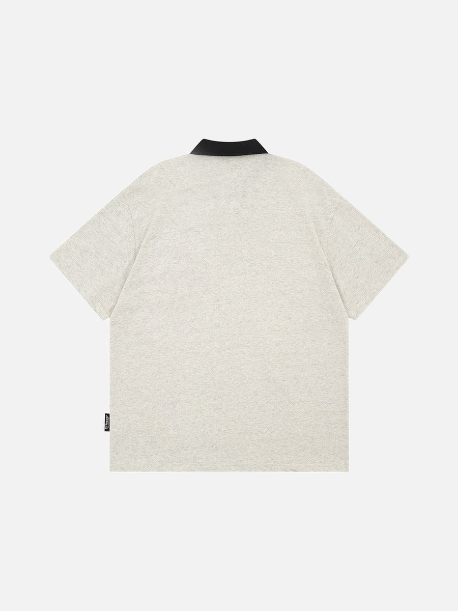Poloshirt mit Cartoon-Stickerei – lockere Passform