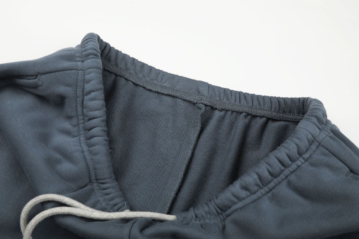 Jean large crème en denim à taille côtelée