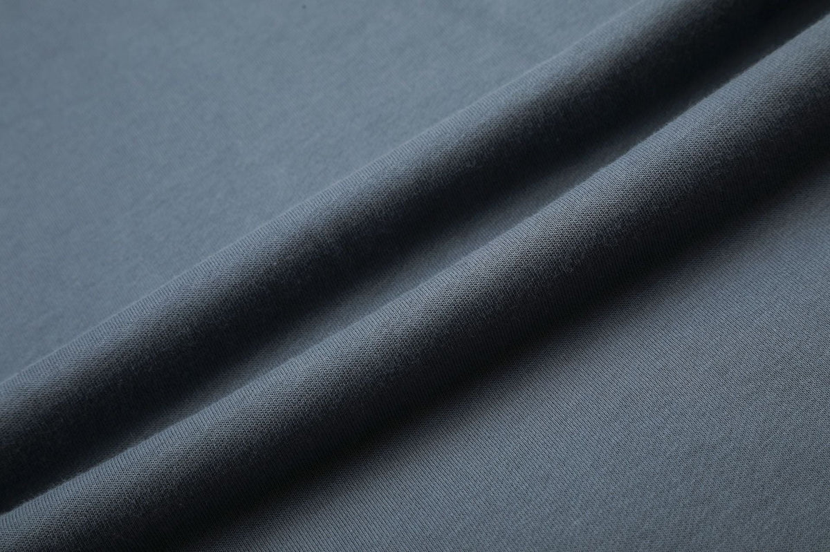 Jean large crème en denim à taille côtelée
