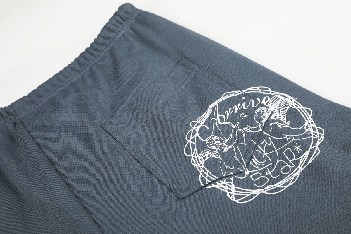 Jean large crème en denim à taille côtelée