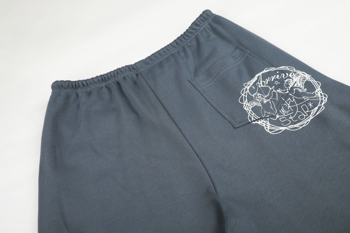 Jean large crème en denim à taille côtelée