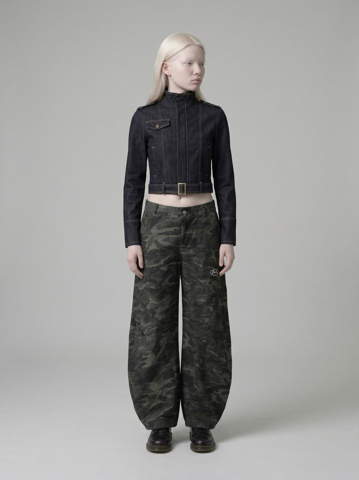 DAXUEN Cropped military denim jacket with gold stitching — model photo