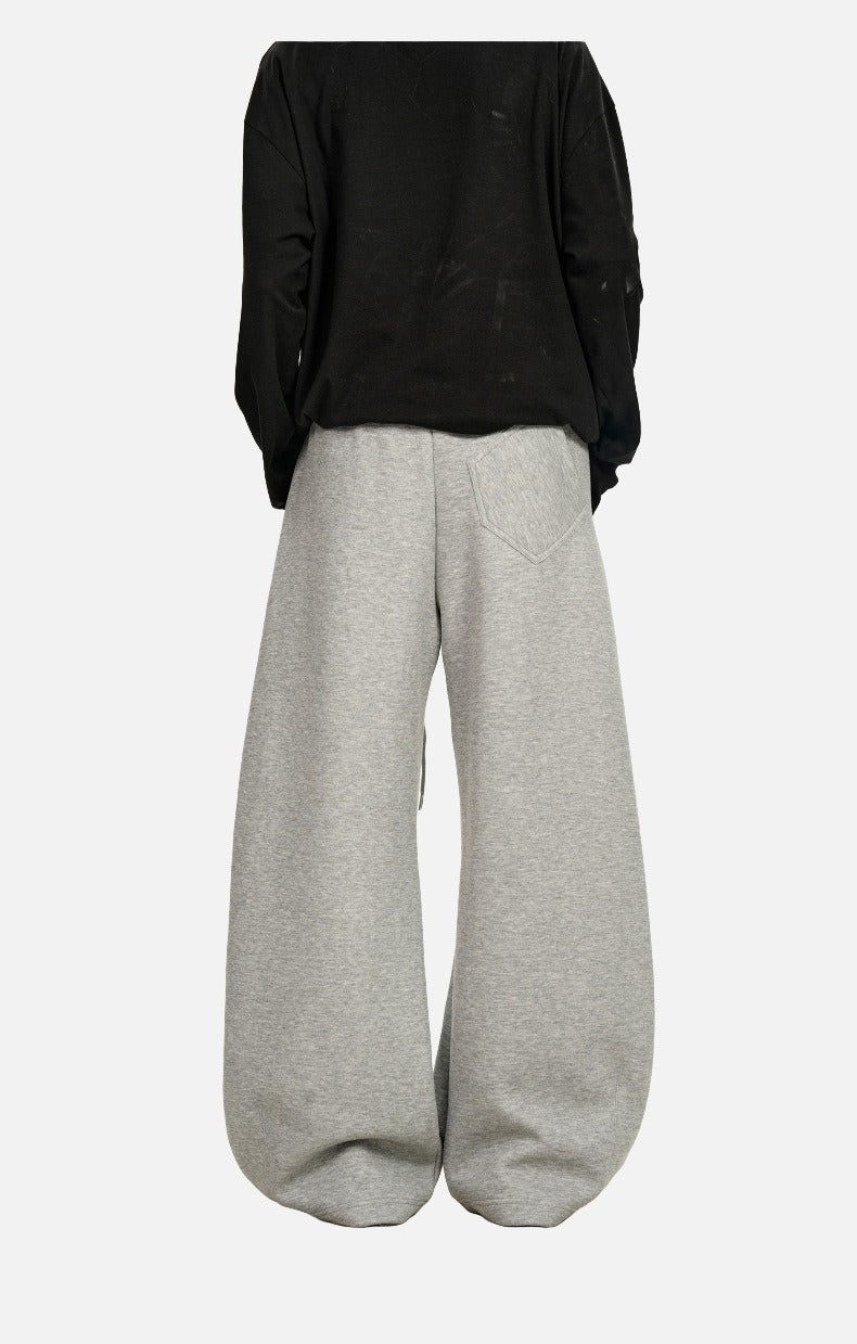 Curved Silhouette Wide-Leg Pants