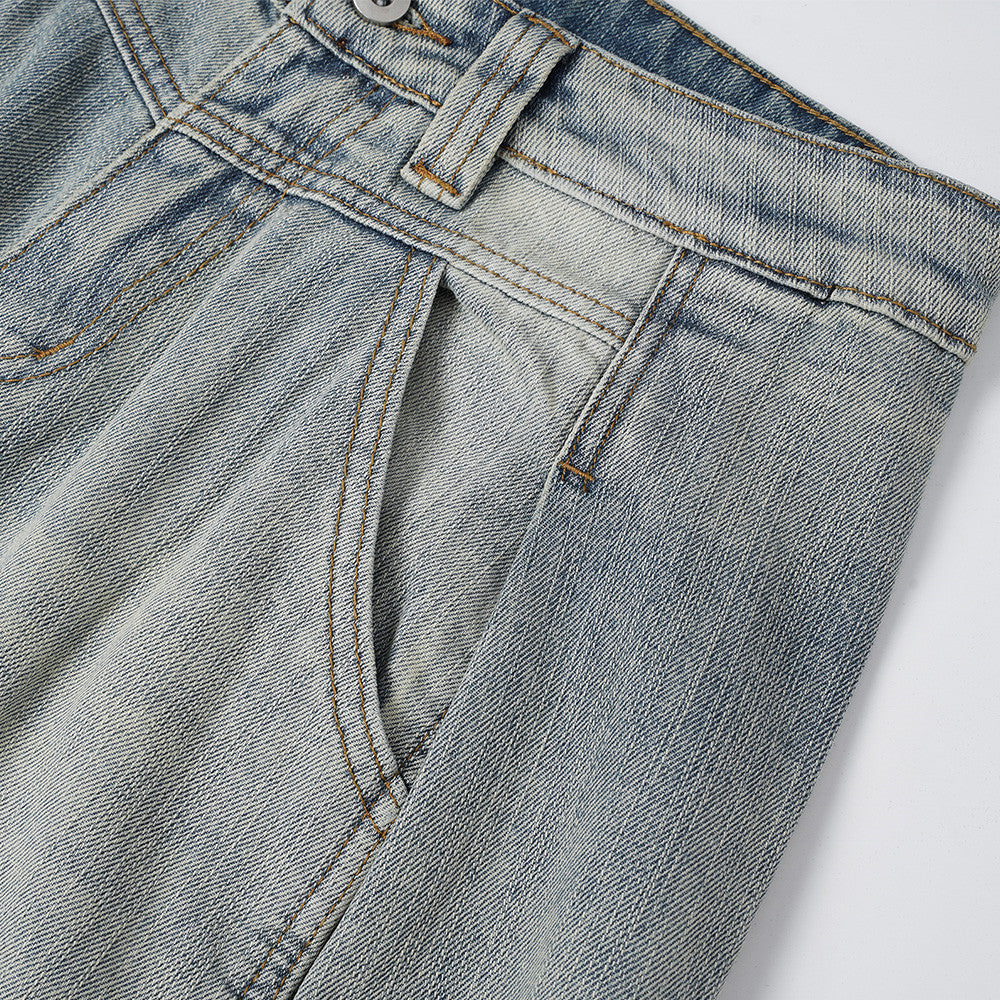 Distressed Barrel-Leg Denim Jeans