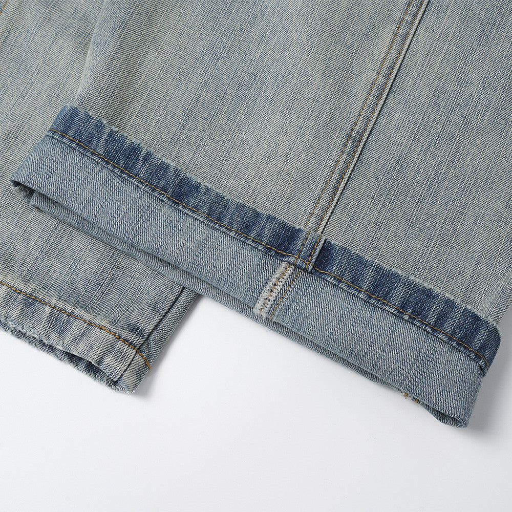 Distressed Barrel-Leg Denim Jeans