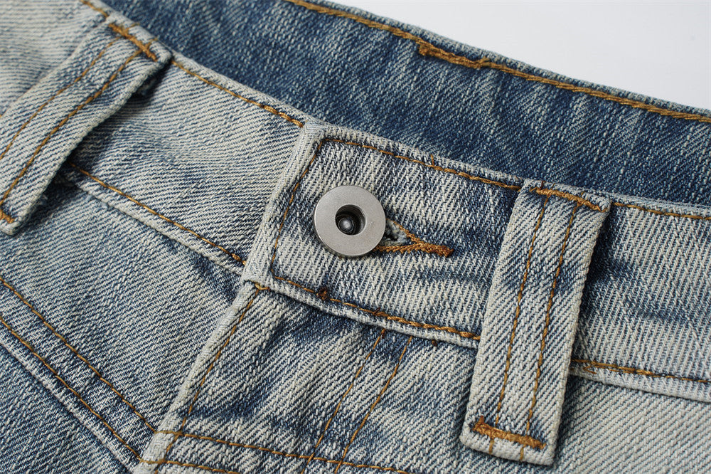 Distressed Barrel-Leg Denim Jeans