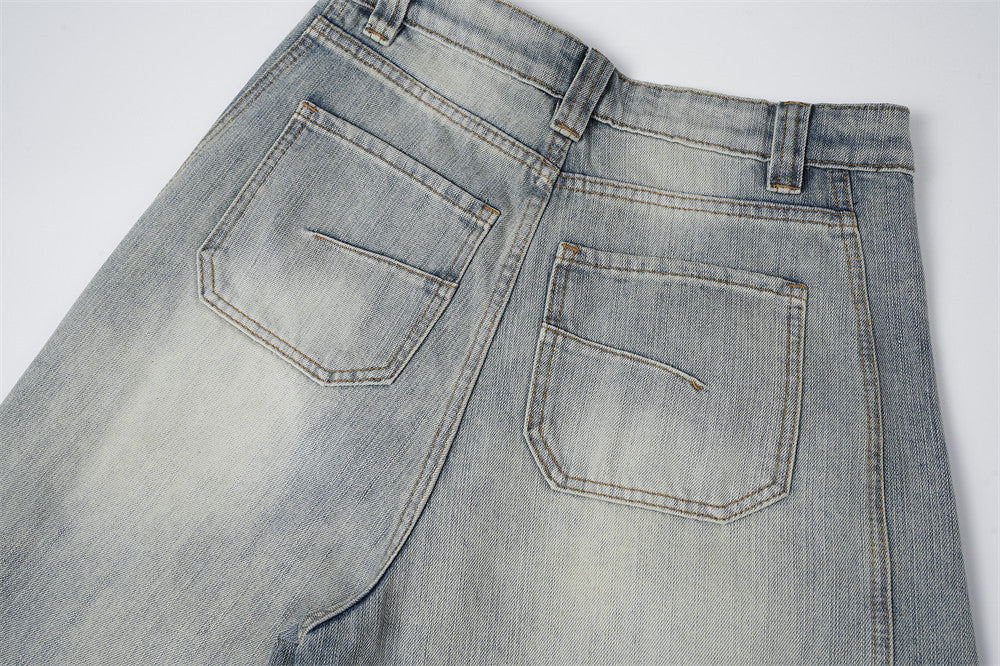Distressed Barrel-Leg Denim Jeans