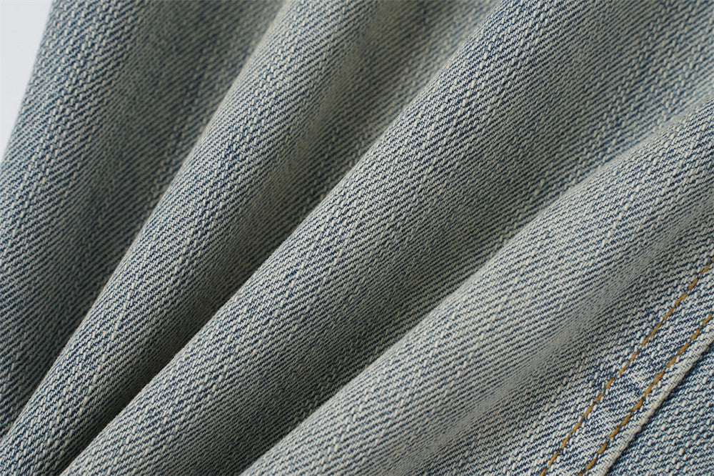 Distressed Barrel-Leg Denim Jeans
