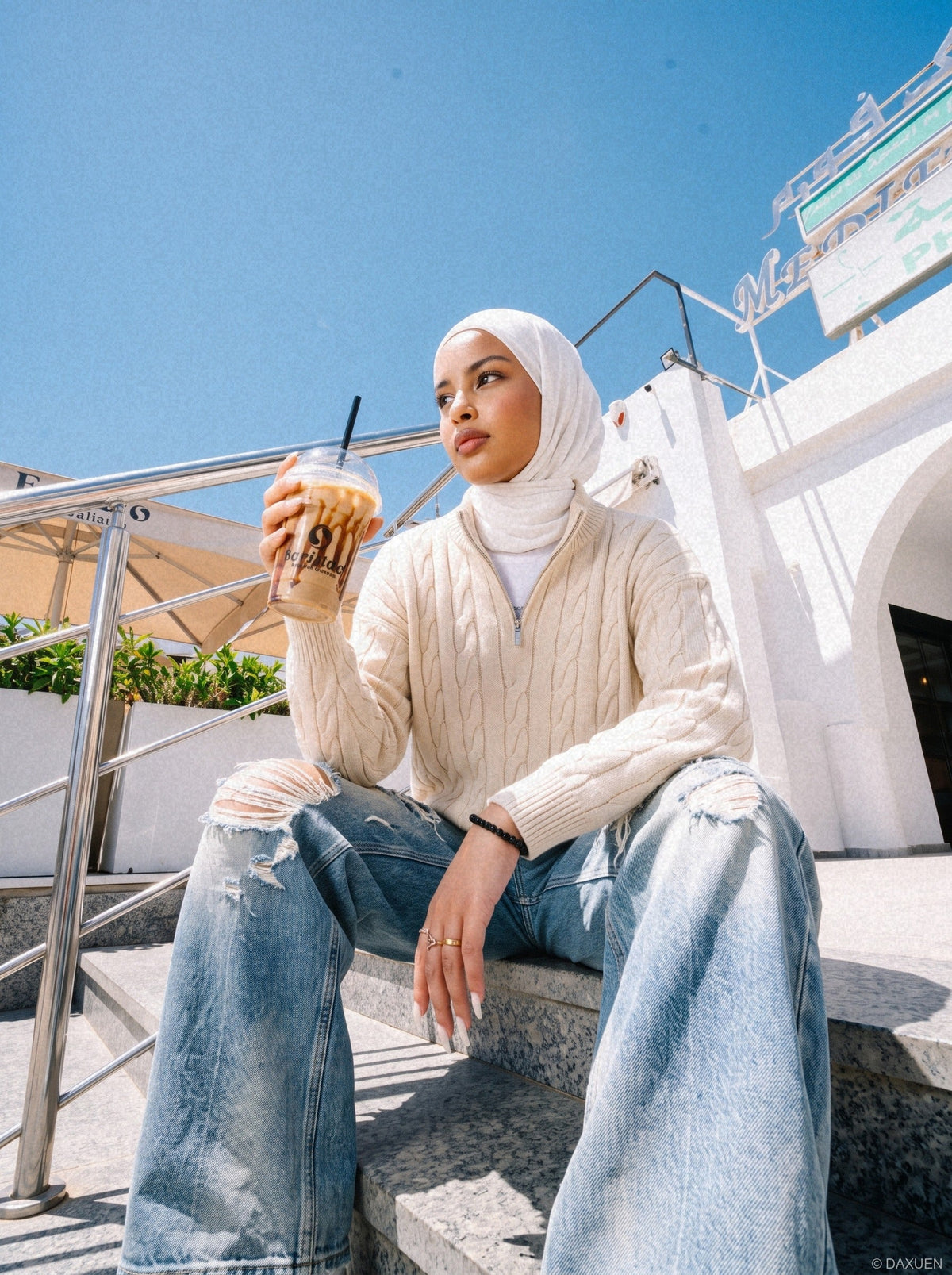 DAXUEN distressed blue wide-leg ripped jeans — model photo