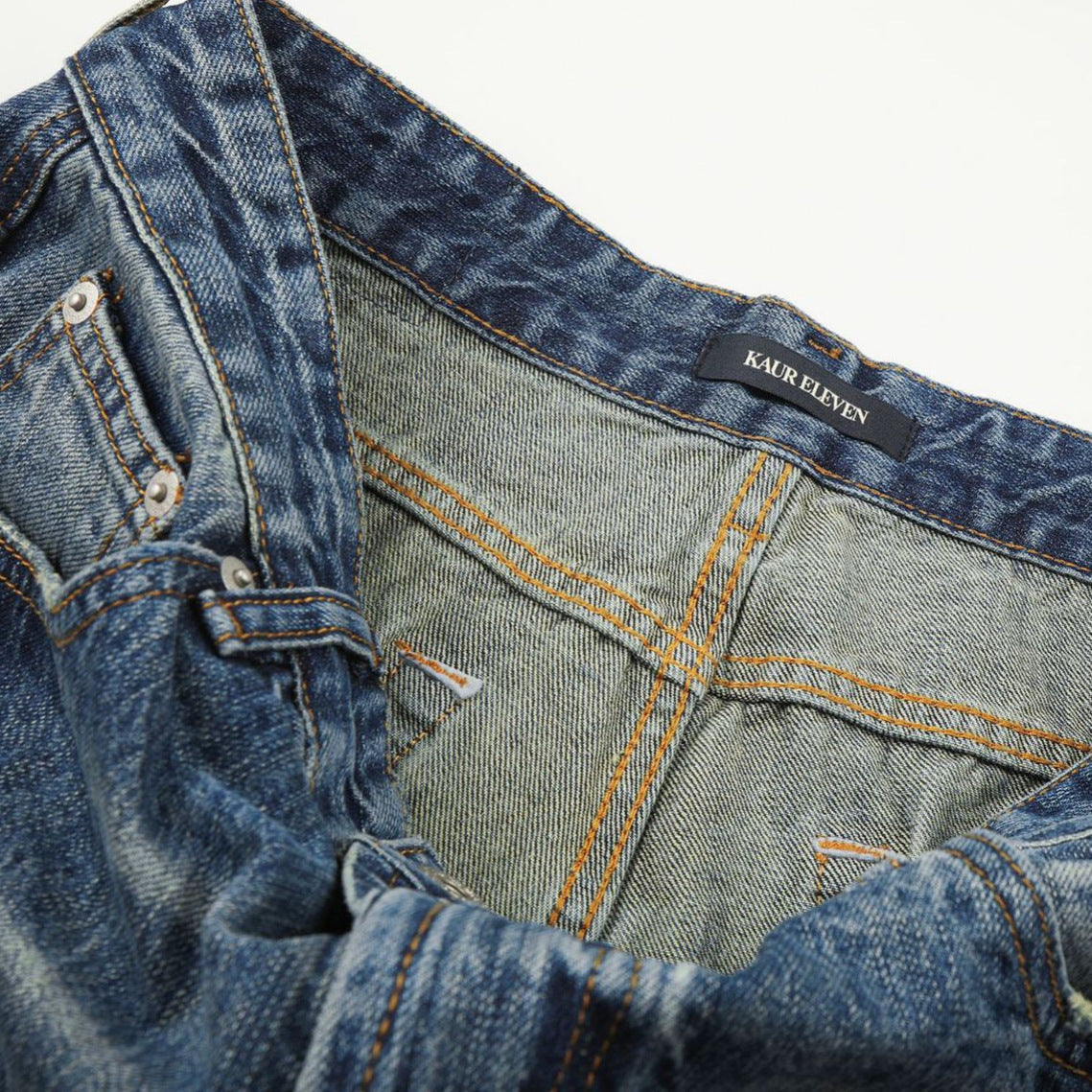 DAXUEN faded medium blue distressed wide-leg denim jeans
