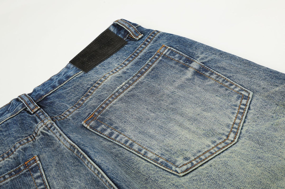 DAXUEN faded medium blue distressed wide-leg denim jeans