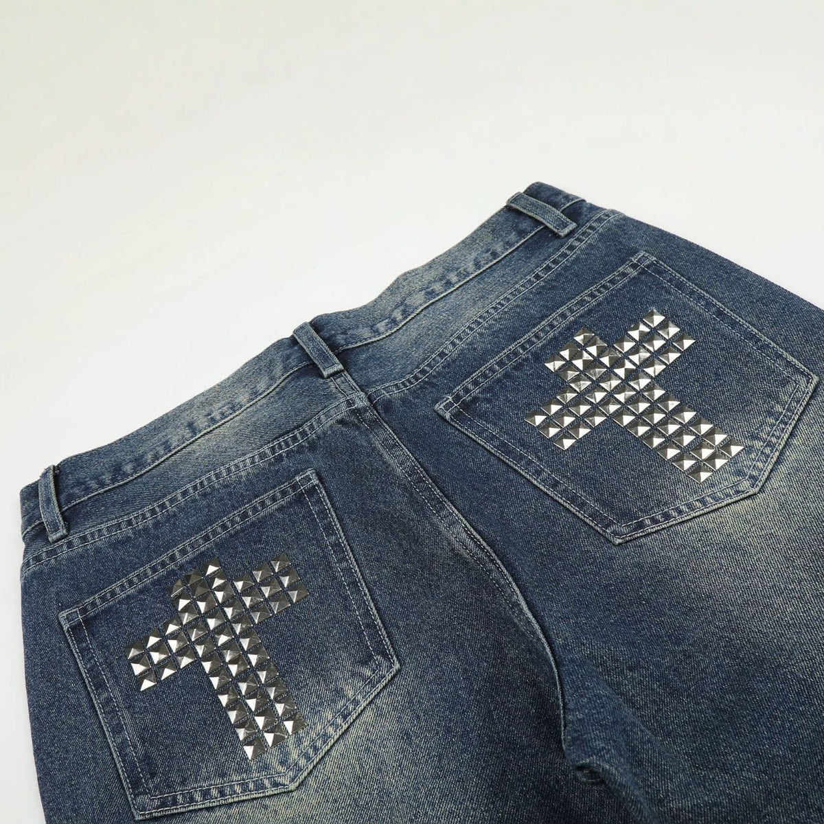 DAXUEN medium wash distressed wide-leg jeans with studs