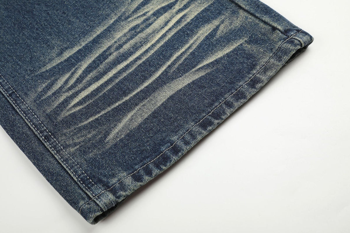 DAXUEN medium wash distressed wide-leg jeans with studs