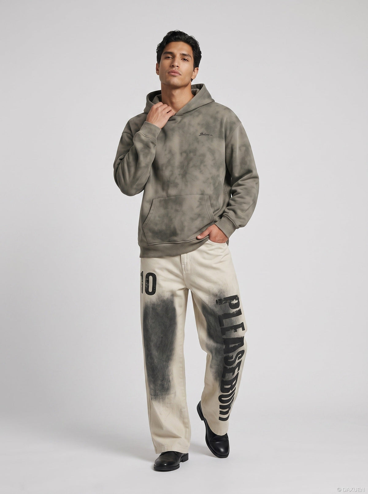 DAXUEN light beige distressed number 10 wide-leg pants — model photo