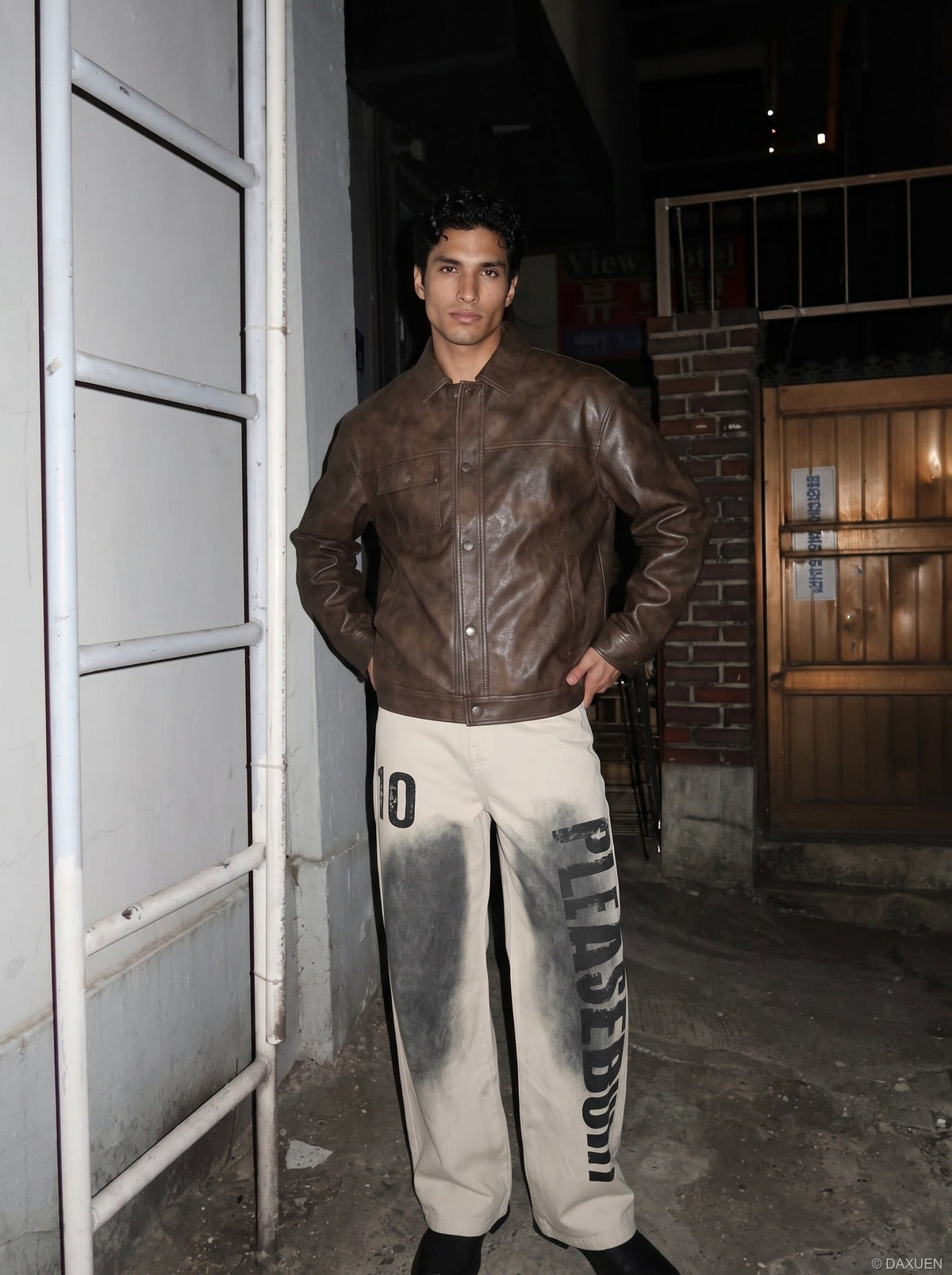 DAXUEN light beige distressed number 10 wide-leg pants — model photo