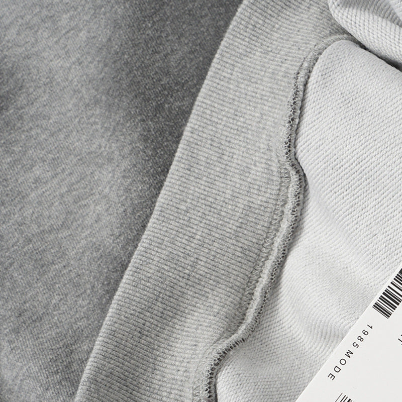 DAXUEN distressed oversized two-tone hoodie sweatshirt