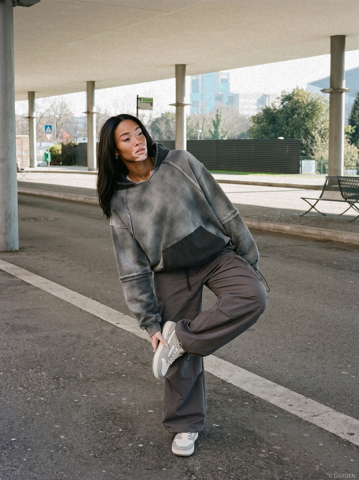 DAXUEN distressed oversized two-tone hoodie sweatshirt — model photo