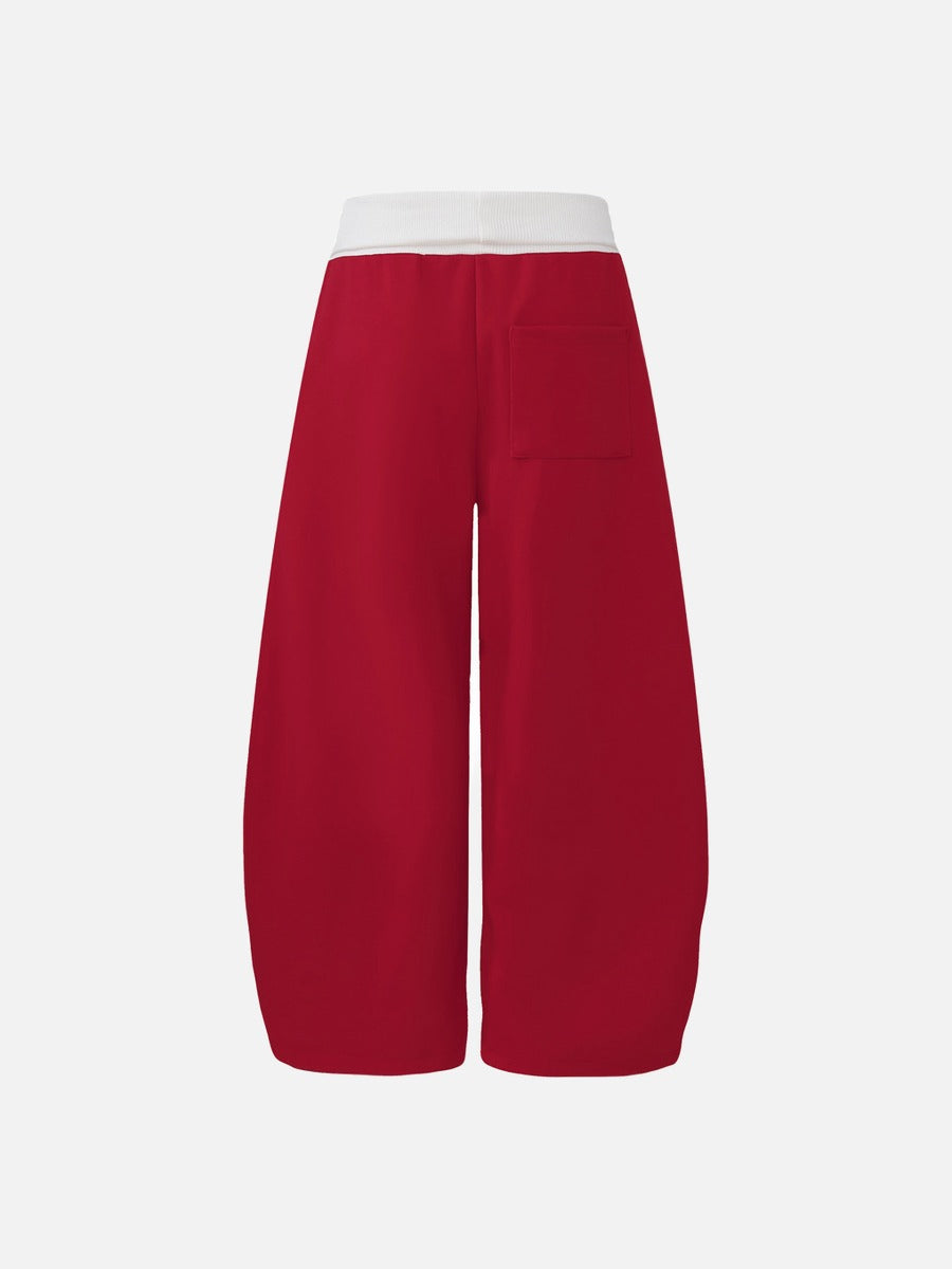 DAXUEN red wide-leg pants with distressed script graphic