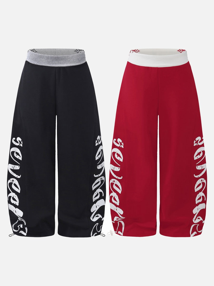 DAXUEN red wide-leg pants with distressed script graphic