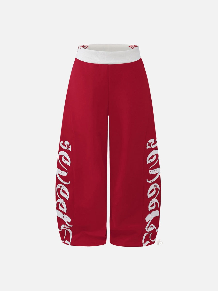 DAXUEN red wide-leg pants with distressed script graphic