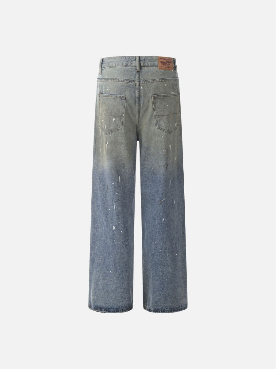 Jean large bleu délavé à éclaboussures de peinture