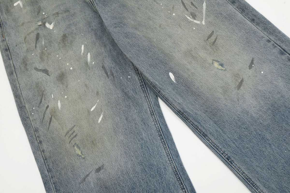 Jean large bleu délavé à éclaboussures de peinture