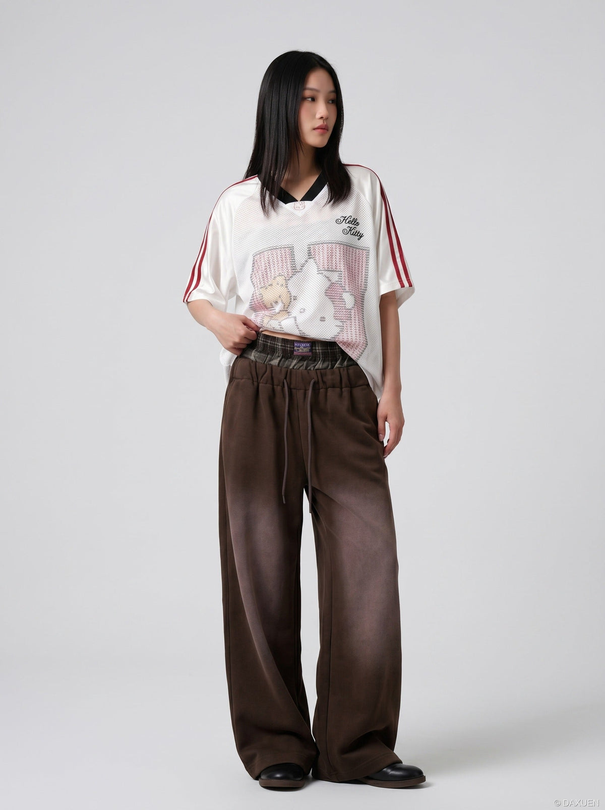 DAXUEN faded brown straight-leg casual pants with plaid waistband — model photo