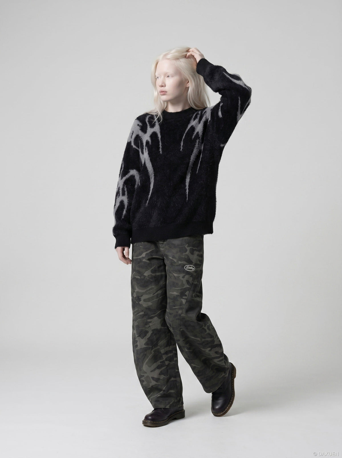 DAXUEN Faux mink texture crew neck sweater with abstract patterns — model photo