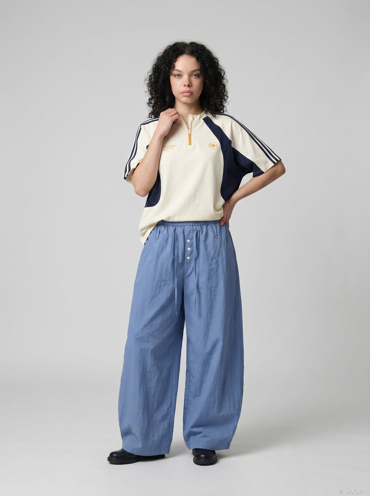 DAXUEN light blue balloon pants with button placket — model photo