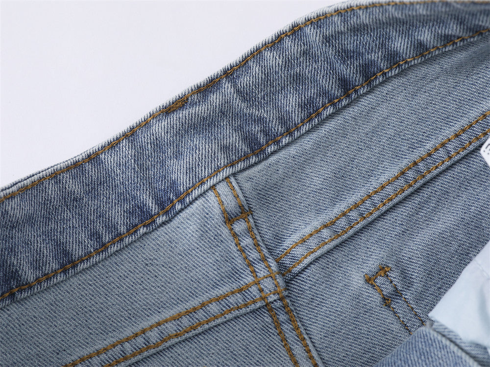 Light Blue Flared Jeans with Star Accents
