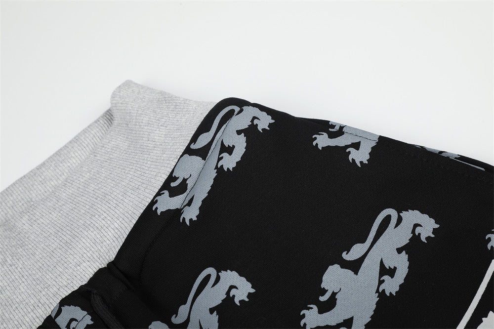 DAXUEN light blue rampant lion graphic jogging pants
