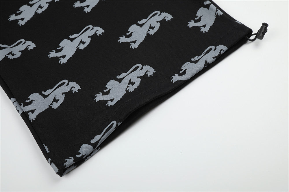 DAXUEN light blue rampant lion graphic jogging pants